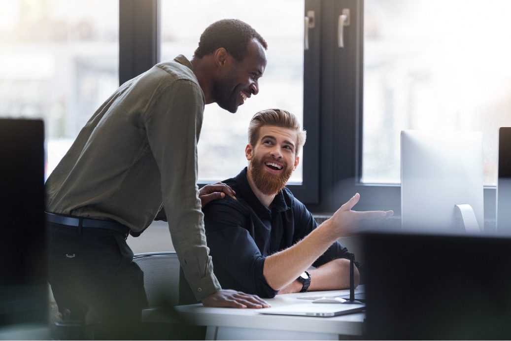 two-happy-men-working-together-new-business-project Men working Small Business